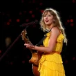 Taylor Swift concert yellow dress GettyImages 2015112497 2400x1600 1 1500x1000